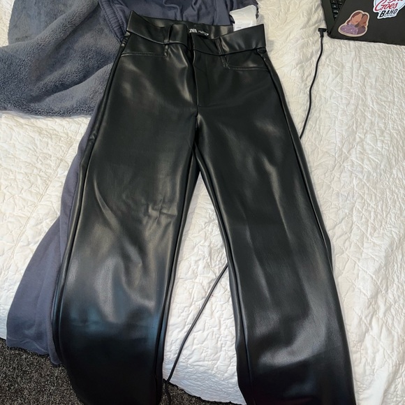 Black faux leather pants. Slight flare. Size S. - Picture 2 of 4